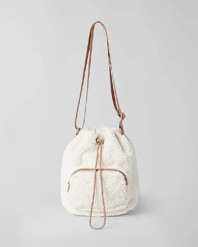 Women's bags with structured shape and smooth leather finish for a timeless design-COZY SHERPA BUCKET BAG