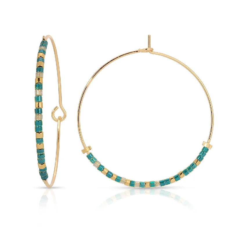 Hoop earrings with circle designs for a classic and timeless shape-Fearless