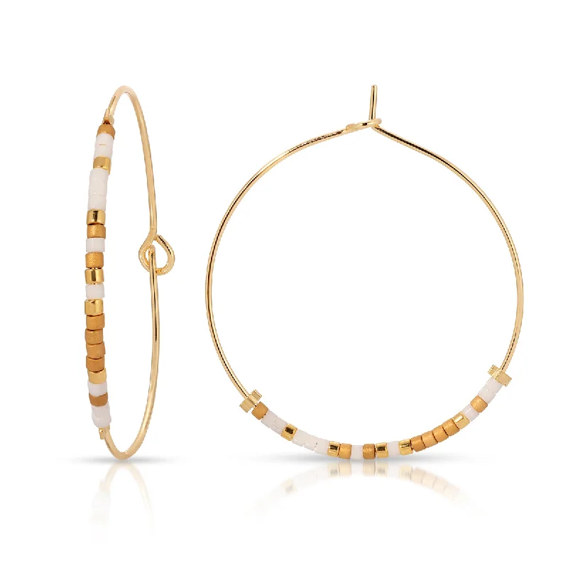 Hoop earrings with oversized designs for a bold, fashion-forward statement-Worthy